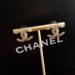 Fashionable rhinestone hollow stud earrings