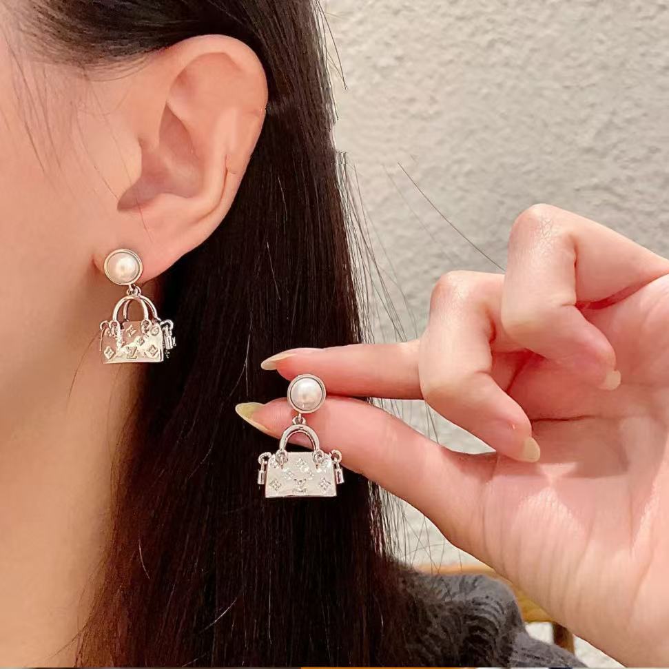 Floral bag pendant earrings