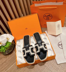 Spliced canvas and leather slippers
