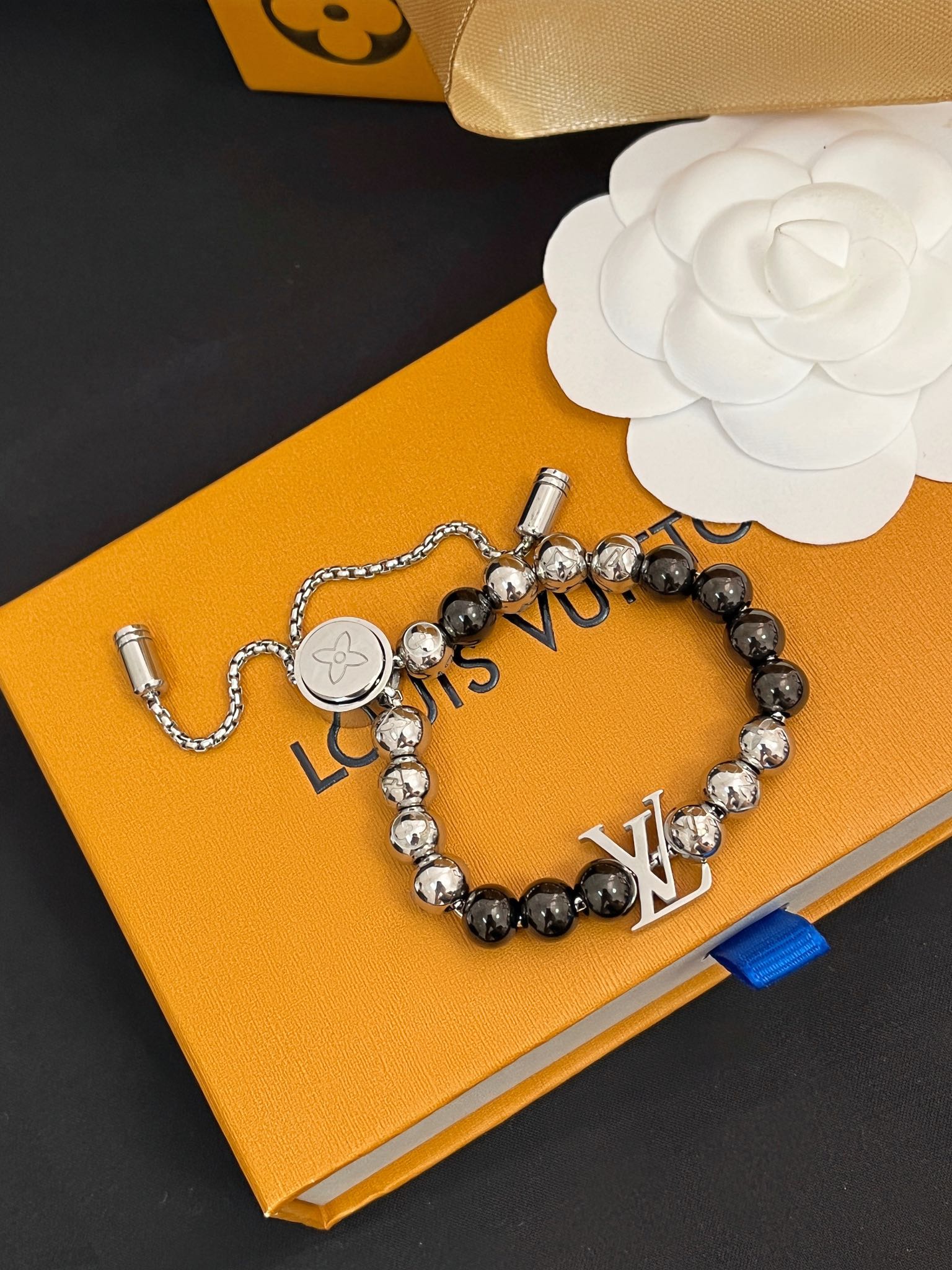Unisex steel ball drawstring bracelet