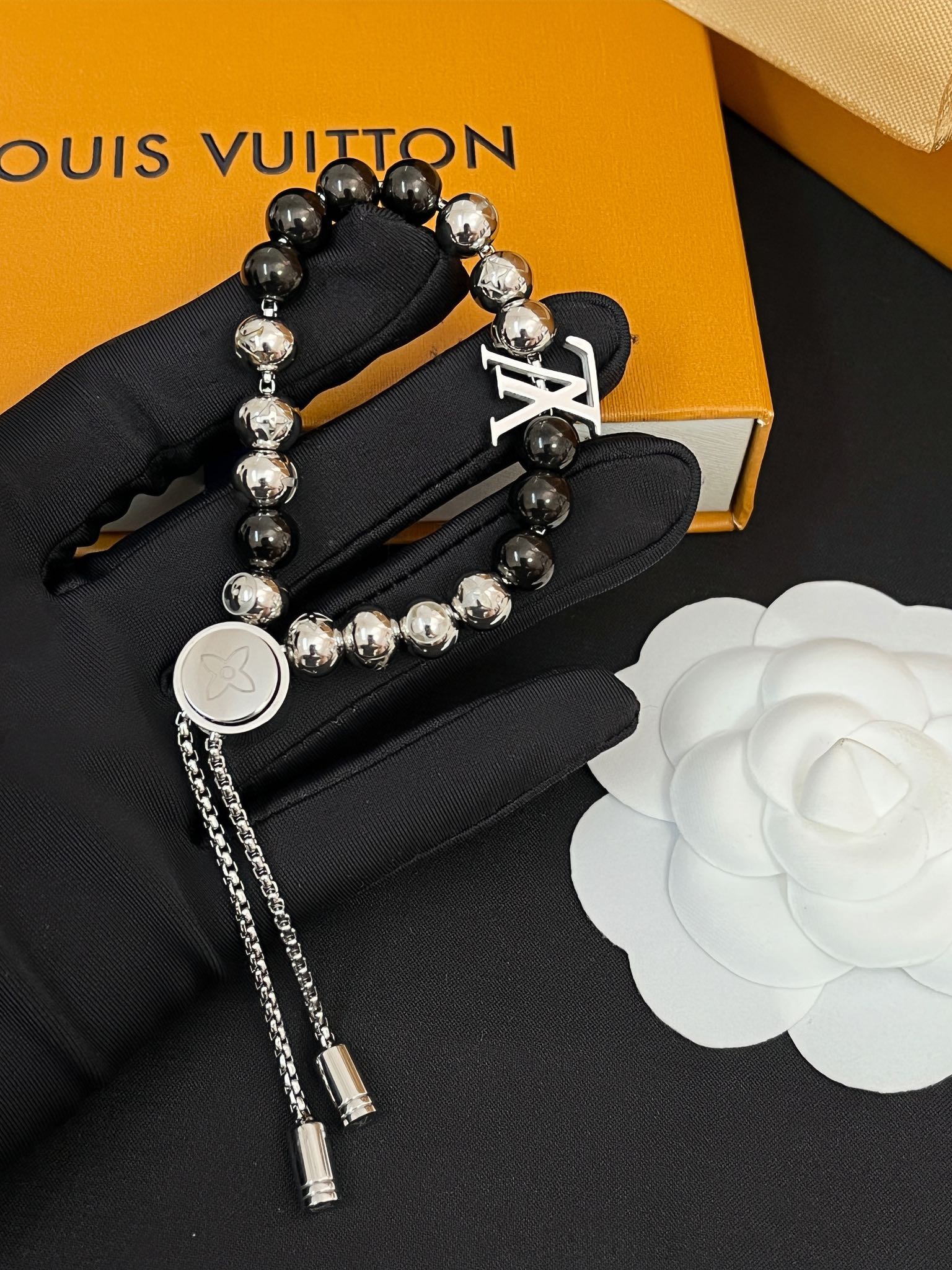 Unisex steel ball drawstring bracelet