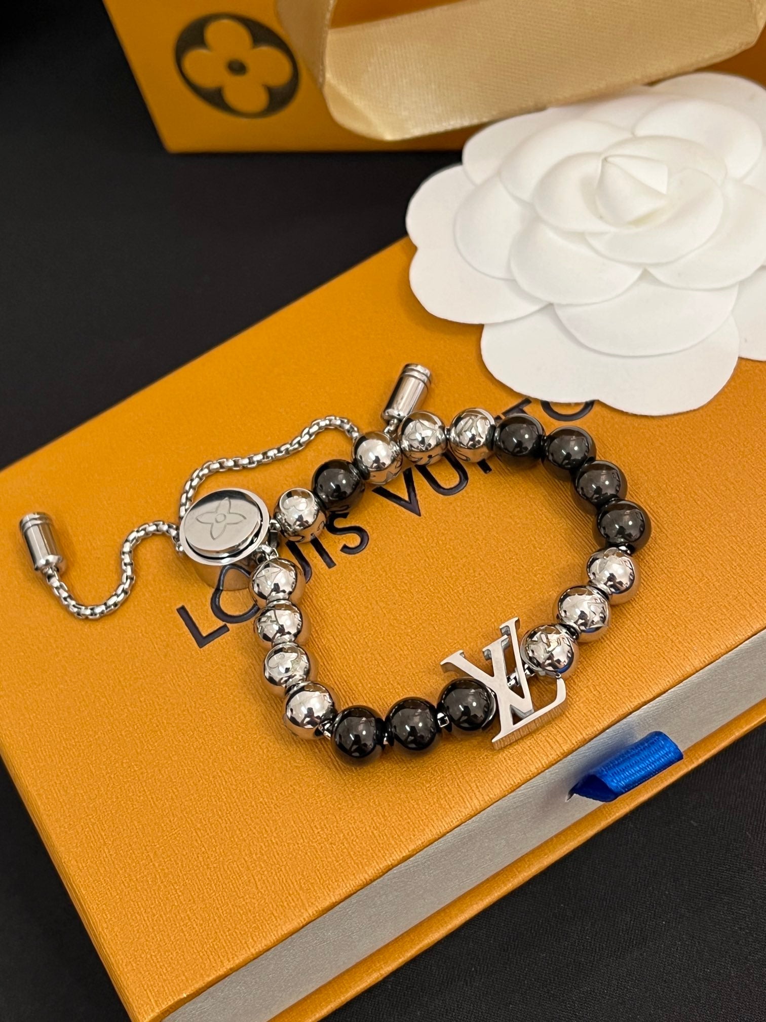 Unisex steel ball drawstring bracelet