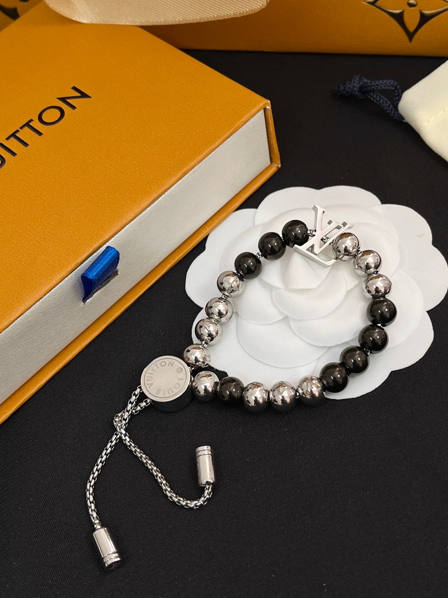 Unisex steel ball drawstring bracelet