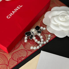 Elegant Pearl Bow Brooch