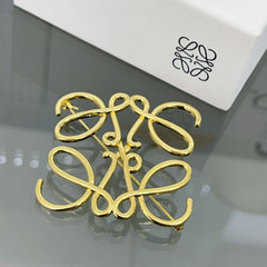Versatile Gold Monogram Brooch