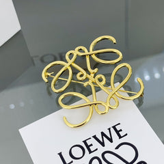Versatile Gold Monogram Brooch