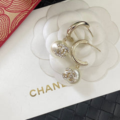Round pearl drop earrings