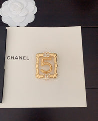 Gold Frame 5-character Brooch