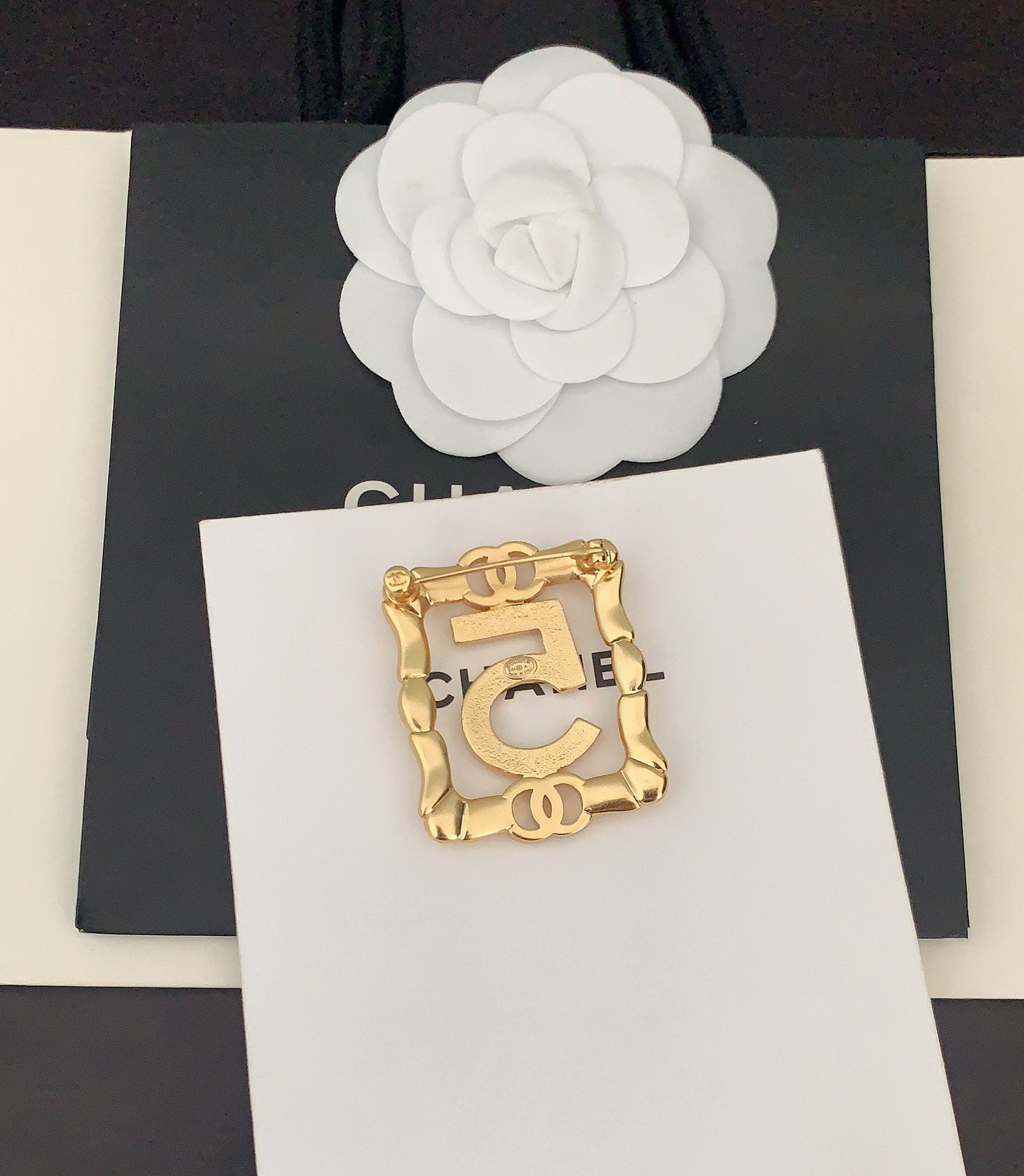 Gold Frame 5-character Brooch