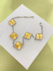 Gold four-leaf clover bracelet