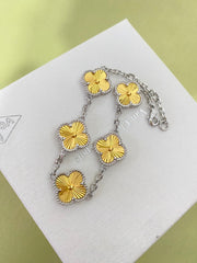 Gold four-leaf clover bracelet
