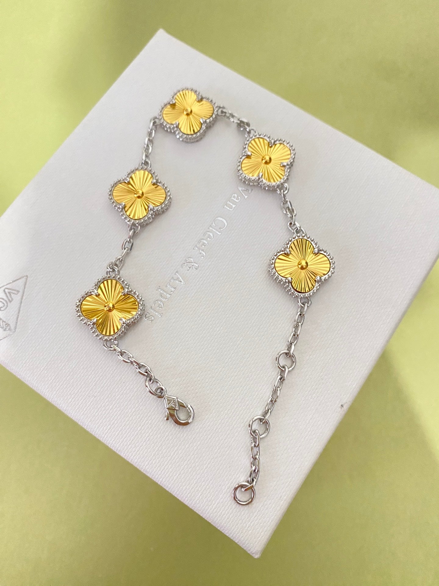 Gold four-leaf clover bracelet