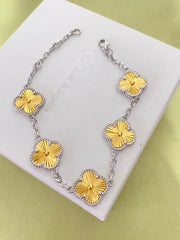 Gold four-leaf clover bracelet
