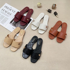Embossed flat slippers