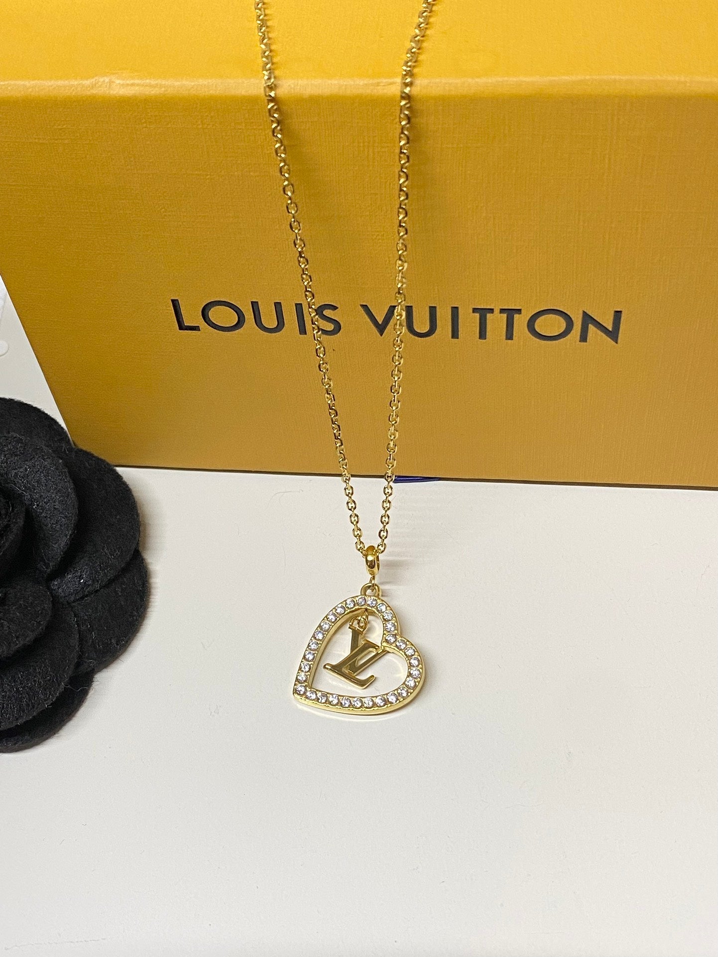 Diamond-encrusted heart-shaped necklace