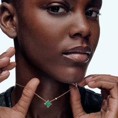 Green gemstone four-leaf clover necklace