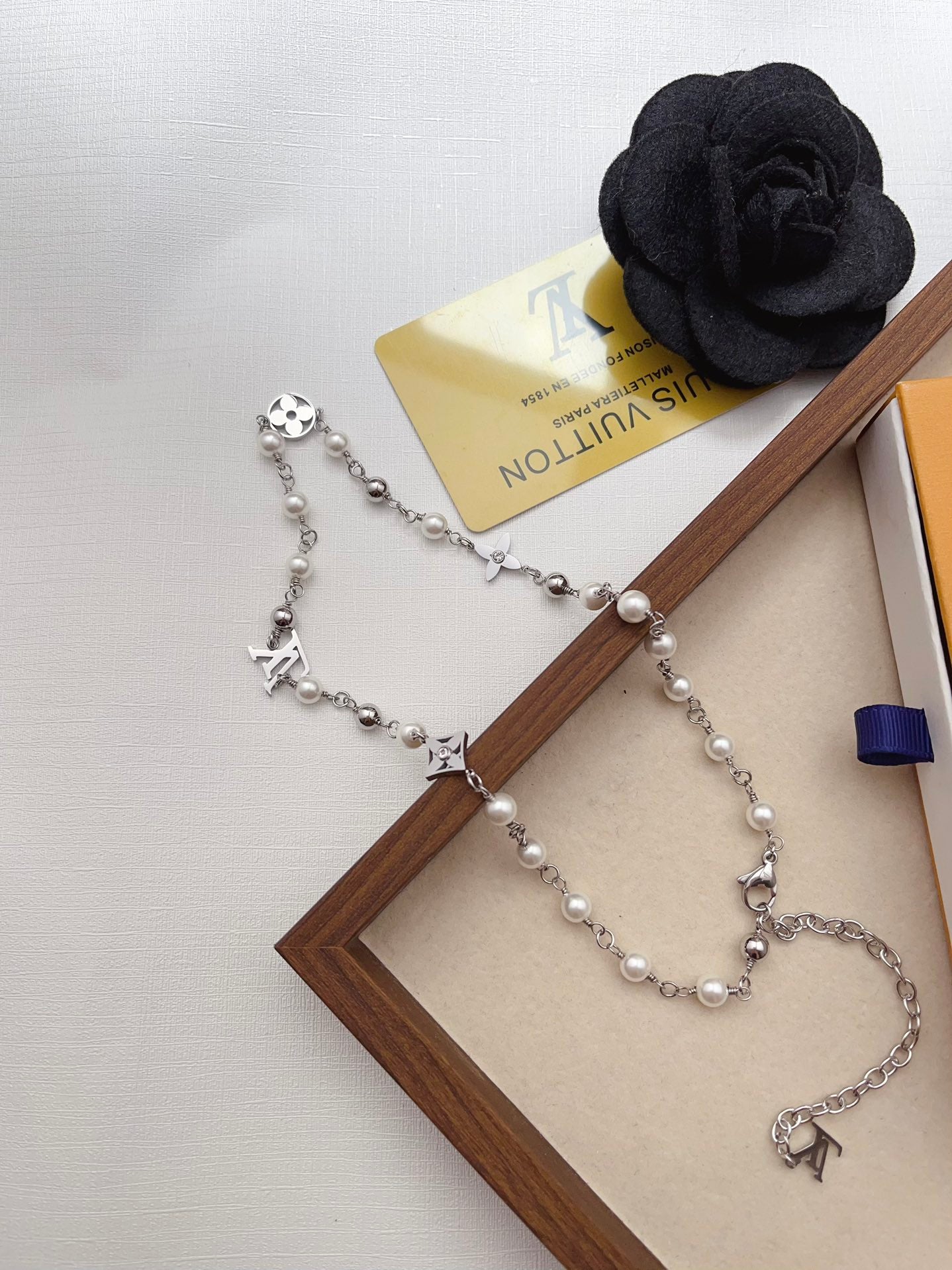 Classic pearl charms bracelet and necklace