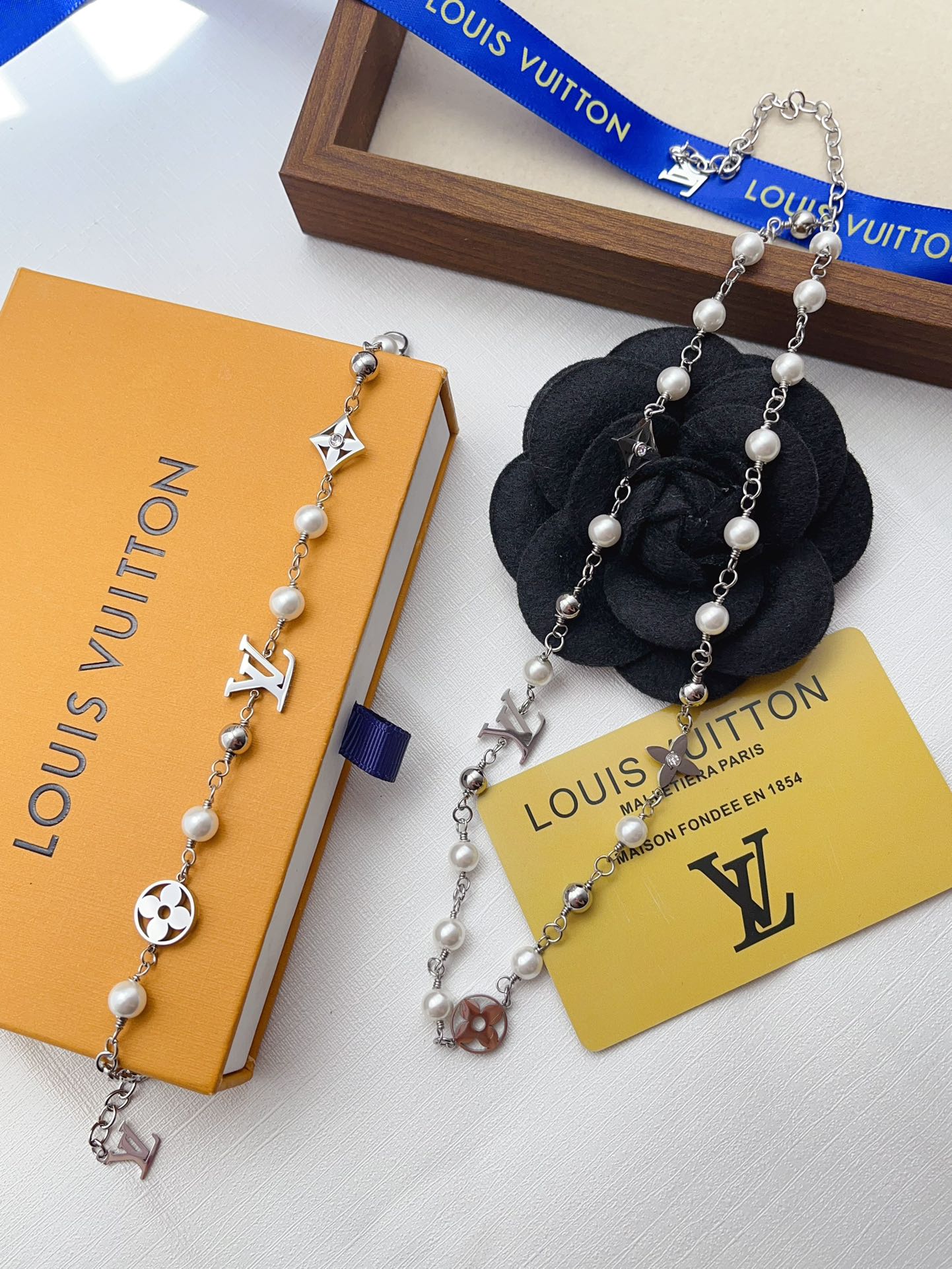 Classic pearl charms bracelet and necklace