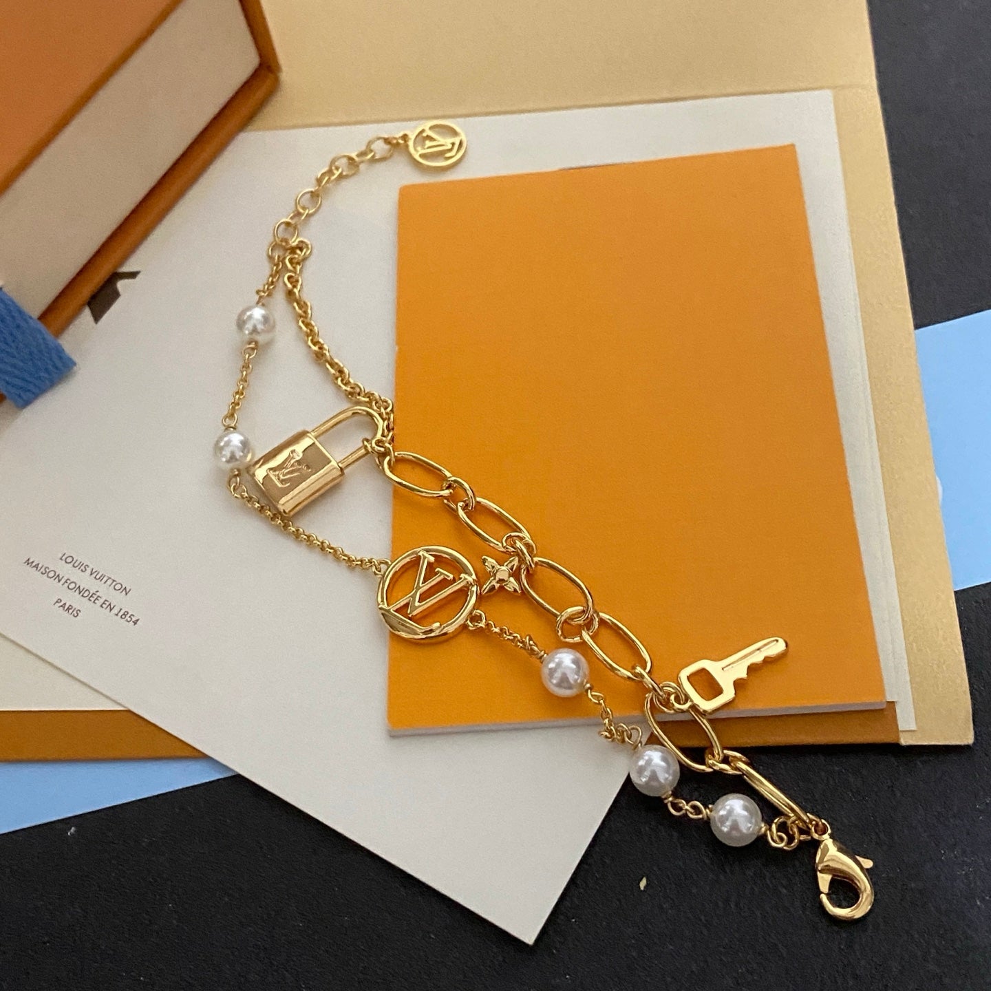 Lock and key charm pearl bracelet