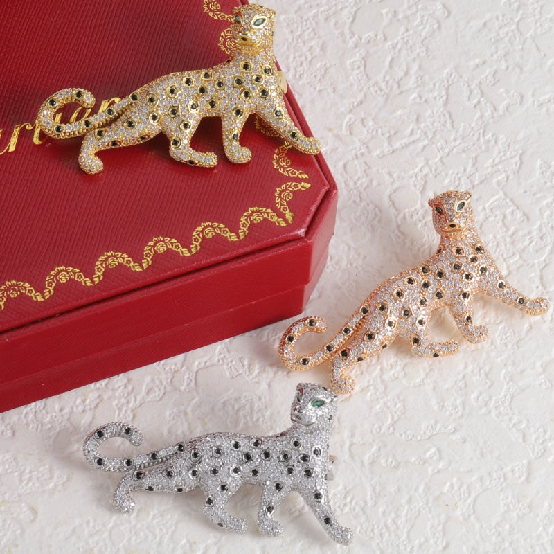 Diamond-encrusted leopard brooch