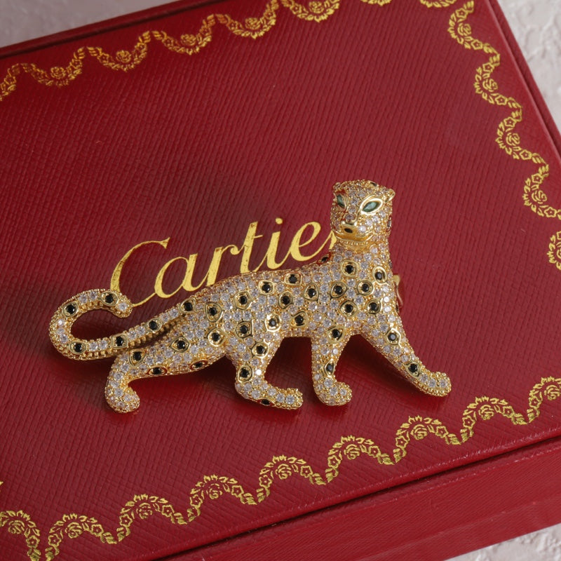 Diamond-encrusted leopard brooch