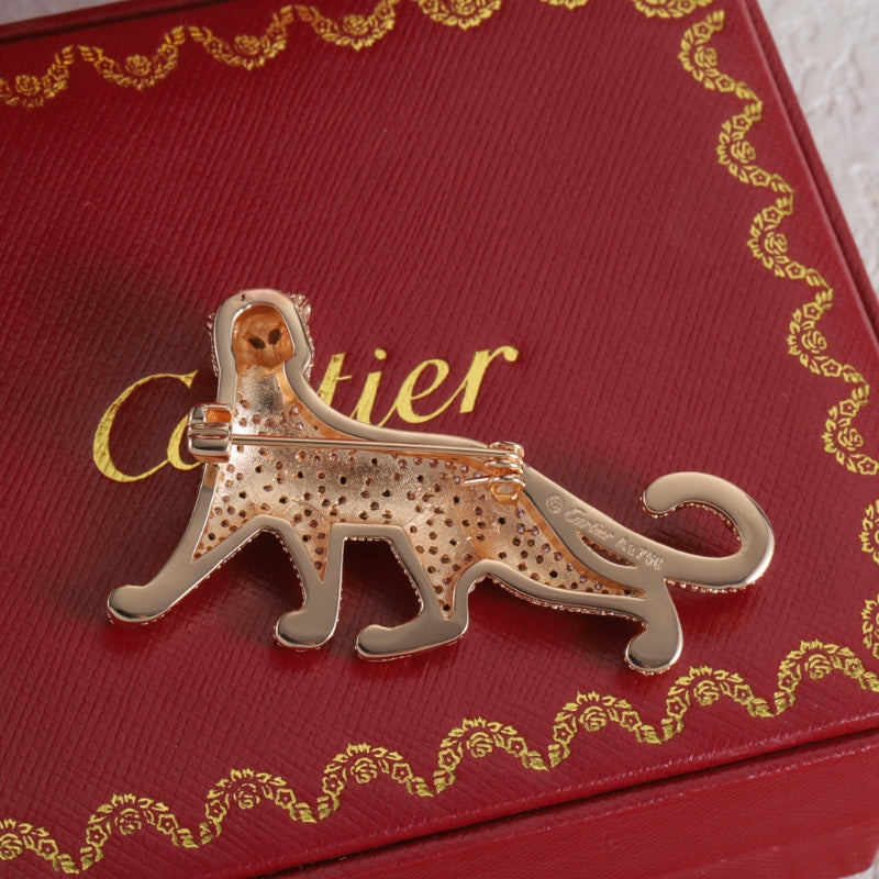 Diamond-encrusted leopard brooch