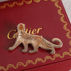 Diamond-encrusted leopard brooch