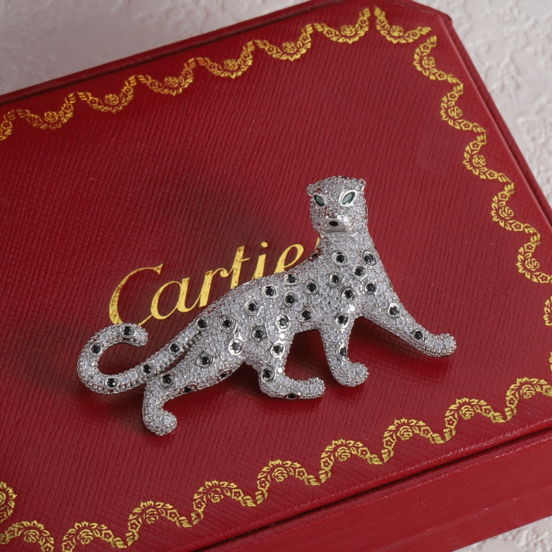 Diamond-encrusted leopard brooch