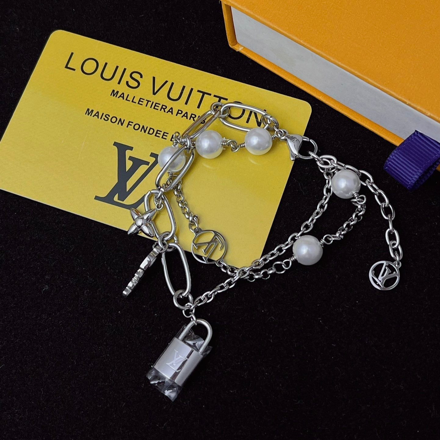 Floral lock pendant silver bracelet