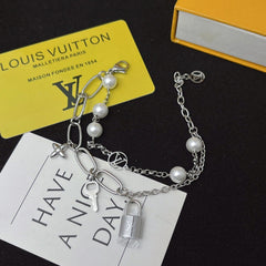 Floral lock pendant silver bracelet