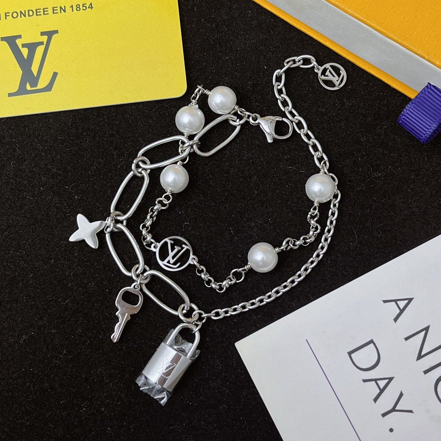Floral lock pendant silver bracelet